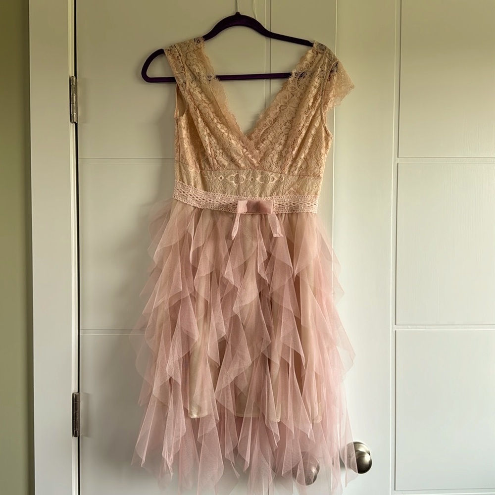 Never worn party dress. Size Medium.